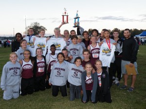 Boys and Girls CC teams with their 1st and 2nd place trophies